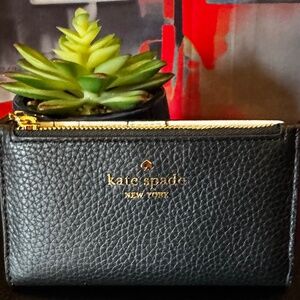 NWT- Kate Spade Pebbled Julia Slim Bifold Wallet in “Black”